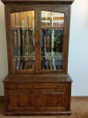 12 gun Walnut gun cabinet